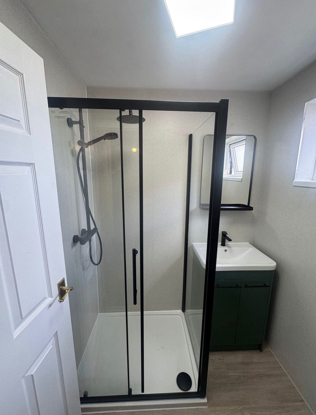 Shower enclosure and vanity